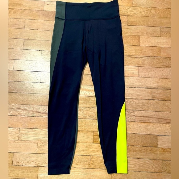 Athleta Pants - Athleta Black and Neon Yellow Colorblock Asym Leggings Women’s S